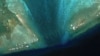 北京公布南中国海争议岛屿领海基线，并称反对菲律宾颁布《海洋区域法》