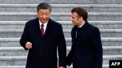 资料照：中国国家主席习近平在北京会晤到访的法国总统马克龙。（2023年4月6日）