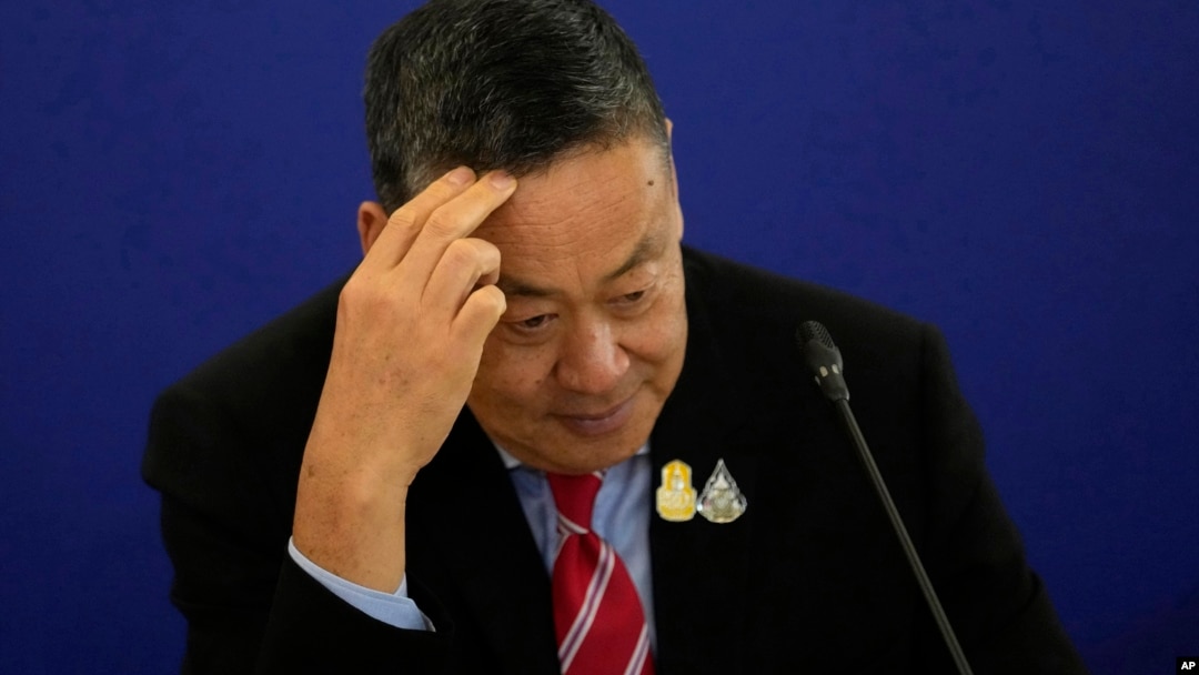 FILE - Thailand's Prime Minister Srettha Thavisin gestures as he talks to media during a news conference at the government house in Bangkok, Thailand, April 10, 2024. 