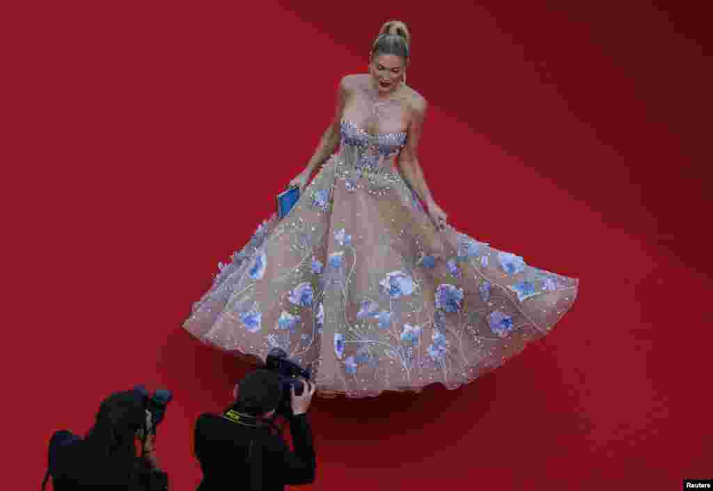Hofit Golan poses on the red carpet during arrivals for the screening of the film "Horizon: An American Saga - Chapter 1" Out of competition at the 77th Cannes Film Festival in Cannes, France.