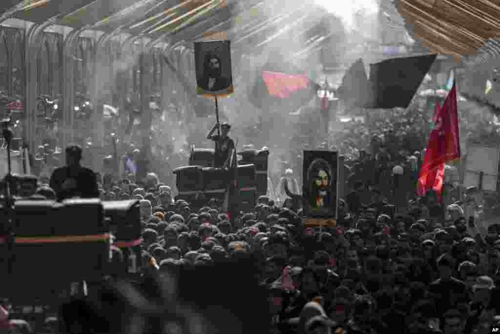 Shiite pilgrims mark the holiday of Arbaeen in Karbala, Iraq.&nbsp;The holiday marks the end of the 40-day mourning period after the anniversary of the martyrdom of Imam Hussein, the Prophet Muhammad&#39;s grandson, in the 7th century. 