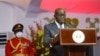 Rais wa Ghana Nana Akufo-Addo (wapili kulia) akihutubia baada ya kuapishwa katika Ikulu ya Ghana. Picha na Nipah Dennis / AFP.