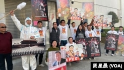 抗议人士下车，围绕中国驻旧金山总领事馆游行抗议。（周星晨）