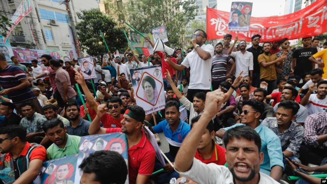 Bangladesh Nationalist Party activists shout slogans in Dhaka, Oct. 28, 2023. Party members want the resignation of Prime Minister Sheikh Hasina and the transfer of power to a nonpartisan caretaker to oversee general elections next year.
