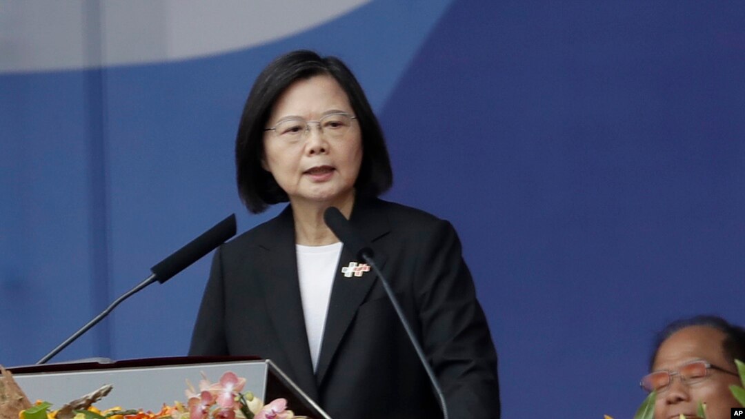 FILE - Taiwan's President Tsai Ing-wen speaks in front of the Presidential Building in Taipei, Taiwan, Oct. 10, 2023.
