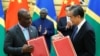 资料照：中国国务委员兼外交部长王毅与所罗门群岛外长马内莱2019年10月9日在中国北京人民大会堂出席一个签字仪式。（路透社）