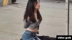 网络疯传的广州跪地女视频截图