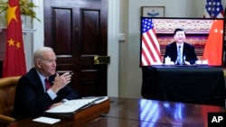 Presidente americano, Joe Biden, e Presidente chinês, Xi Jinping, num encontro virtual, 15 de Novembro 2021