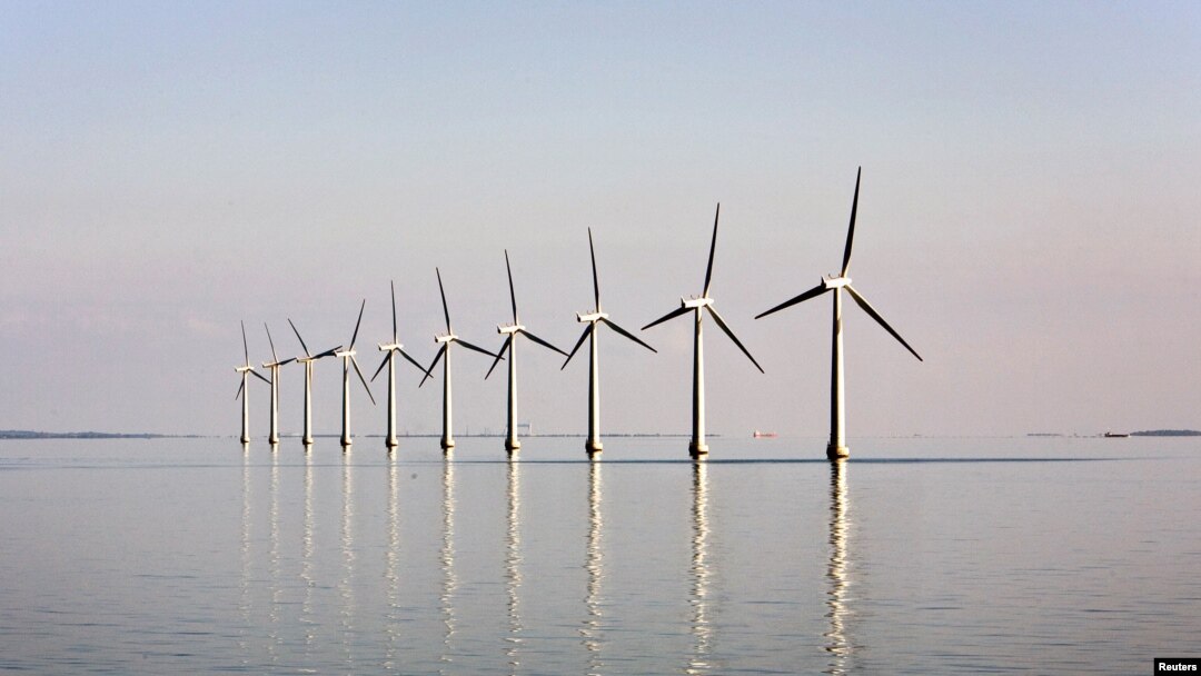 FILE - An off-shore wind farm stands in the water near the Danish island of Samso, May 19, 2008.