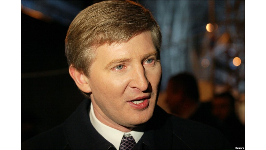 Rinat Akhmetov speaks to the media during an election rally in the eastern Ukrainian city of Donetsk March 24, 2006.