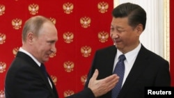 俄罗斯总统普京和中国国家主席习近平。