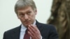 Spokesman Dmitry Peskov gestures at the Kremlin in Moscow, Russia, March 26, 2018. 