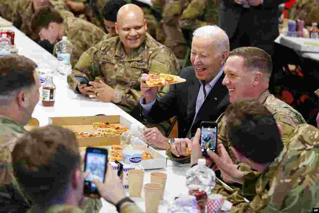 President Joe Biden visits with members of the 82nd Airborne Division at the G2A Arena, in Jasionka, Poland.