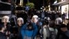 FILE - Riot police officers block the way as journalists try to report on a protest, in Istanbul, Turkey, Oct. 26, 2022.