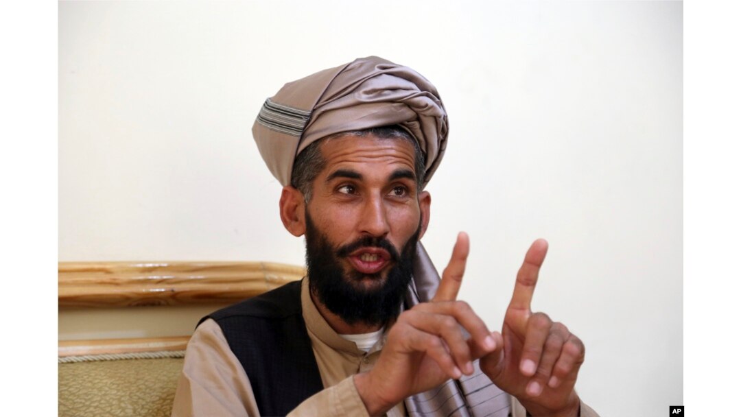 Masih Rahman speaks during an interview with the Associated Press in Kabul, Afghanistan, April 23, 2019. In September last year Masih Rahman's entire family of 11 people, his wife, four daughters, three sons and four nephews, were killed when a bomb flattened their home in central Maidan Wardak province..