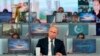 Russian President Vladimir Putin listens to a question during his annual call-in show in Moscow, June 7, 2018. 