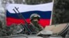 Putin Orders Troops Away From Ukraine Border