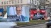 Портрети Фрідріха Мерца і Олафа Шольца, лідерів найбільших суперницьких партій на виборах у Німеччині, Християнсько-демократичного союзу і Соціал-демократичної партії.