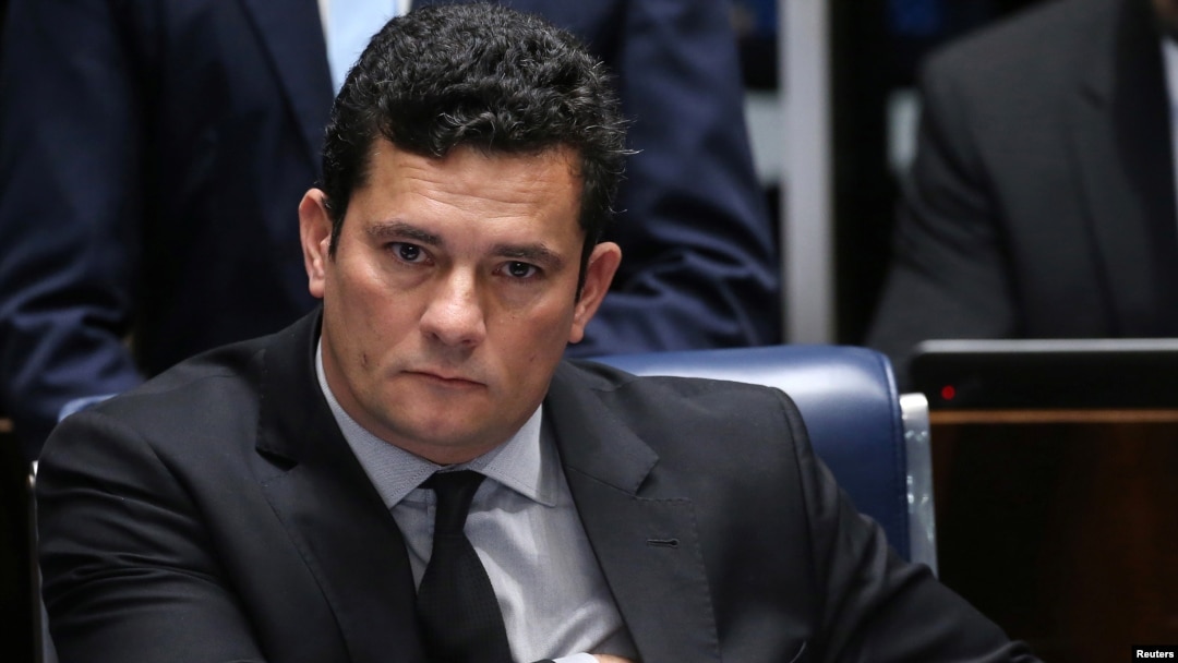 FILE - Brazilian federal judge Sergio Moro reacts during a session at the Federal Senate in Brasilia, Brazil, Dec. 1, 2016.