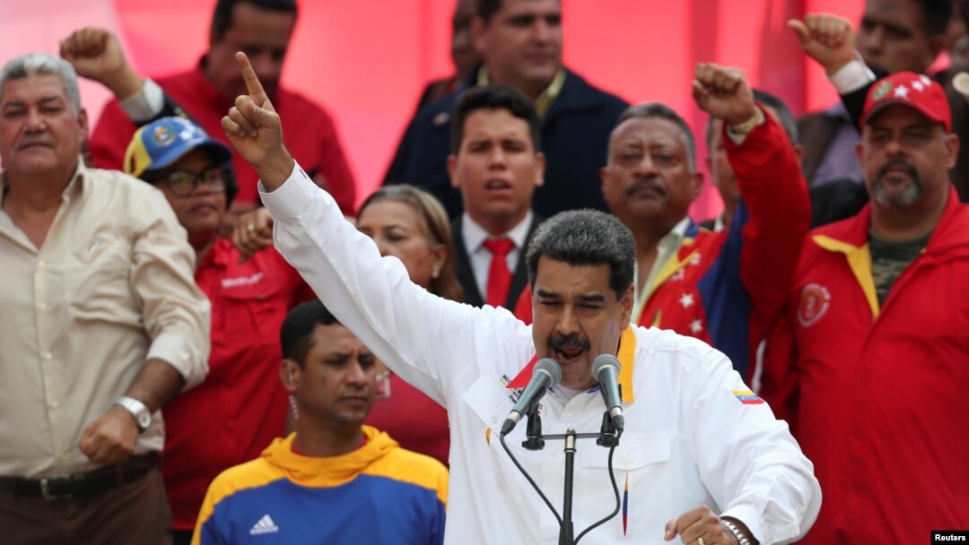 FILE - Venezuela's President Nicolas Maduro talks during a rally in support of the government in Caracas, Venezuela, May 20, 2019.