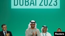 第28届联合国气候大会（COP 28）在谈判两周后2023年12月13日达成共识。（路透社）
