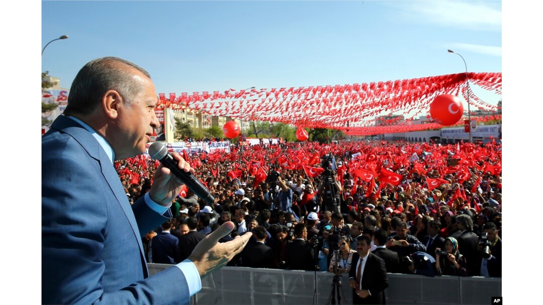 FILE - Turkey's President Recep Tayyip Erdogan addresses his supporters during a referendum rally in Sanliurfa, Turkey, April 11, 2017.