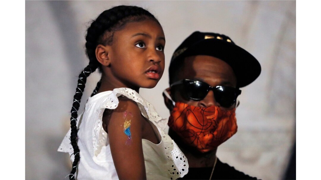 Gianna Floyd, the daughter of George Floyd, listens to a a news conference with Stephen Jackson, June 2, 2020, in Minneapolis, Minn.