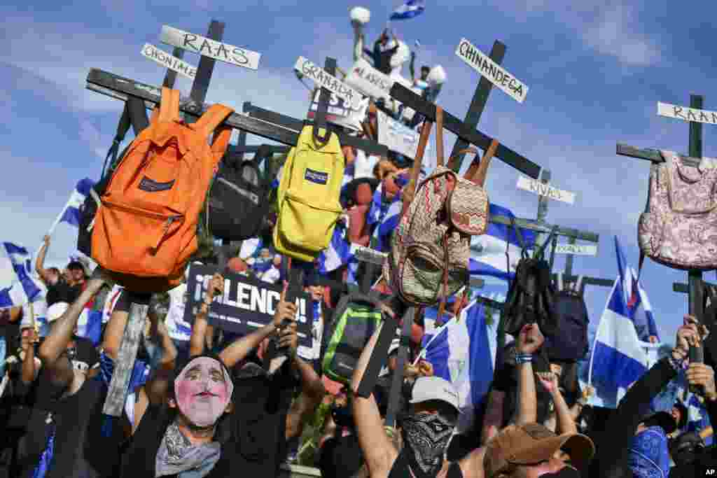University students takes part in a march against Nicaragua's President Daniel Ortega in Managua, Nicaragua.