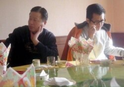 高智晟（左）和郭飞雄（网络图片）