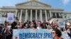 Demonstrators stage a sit-in at the Capitol in Washington, urging lawmakers to take money out of the political process, April 11, 2016.