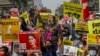 FILE - Demonstrators protest against Myanmar's military junta in Mandalay, Myanmar, Feb. 18, 2021.