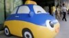 FILE - A mascot of Didi Chuxing is seen at the company's headquarters in Beijing, May 18, 2016.