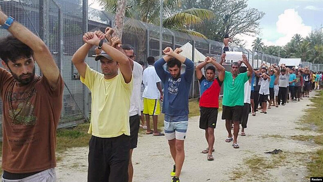 FILE - An undated image released Nov. 13, 2017, shows detainees staging a protest inside the compound at the Manus Island detention center in Papua New Guinea. (Refugee Action Coalition/Handout via Reuters)