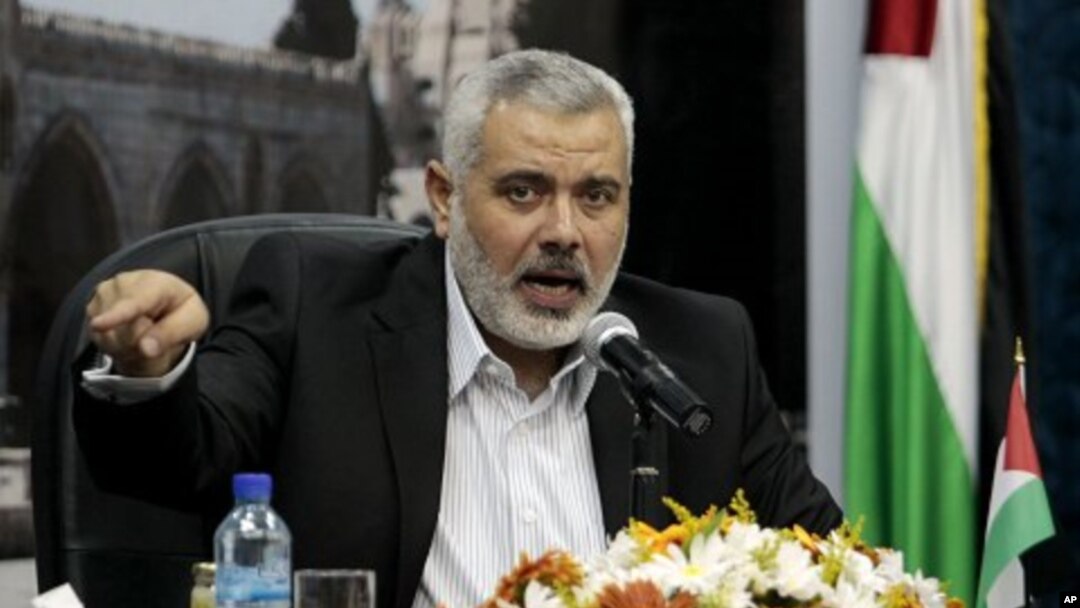 Senior Hamas leader Ismail Haniyeh speaks to the media during a news conference in Gaza City, Monday, May 2, 2011