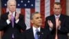 U.S. House Speaker John Boehner (R-OH) and Vice President Joe Biden (L) stand to applaud as President Barack Obama delivers his State of the Union speech on Capitol Hill in Washington, February 12, 2013. REUTERS/Charles Dharapak/Pool (UNITED STATES - Tags