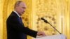 Russian President Vladimir Putin takes the oath during an inauguration ceremony at the Kremlin in Moscow, May 7, 2018. (Sputnik/Aleksey Nikolskyi/Kremlin via Reuters)