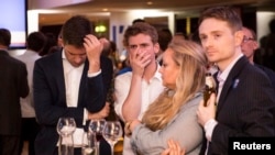 Supporters of the Stronger In Campaign react as results of the EU referendum are announced at the Royal Festival Hall, in London, Britain, June 24, 2016.