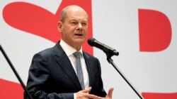 FILE - Olaf Scholz speaks during a press conference at Social Democratic Party headquarters in Berlin, Germany, Sept. 27, 2021.