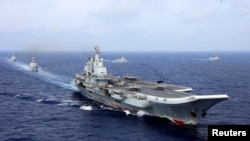 中国航母辽宁号参加中国海军在西太平洋的军事演习。(资料照：2018年4月18日）