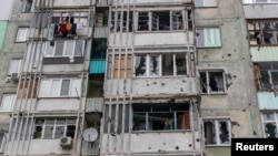 Наслідки російської атаки у Херсоні, 1 грудня 2022. REUTERS/Anna Voitenko