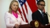 US Secretary of State Hillary Rodham Clinton, left, talks to the media as Indonesian FM Marty Natalegawa listens during a press conference after their meeting in Jakarta, Indonesia, September 3, 2012.