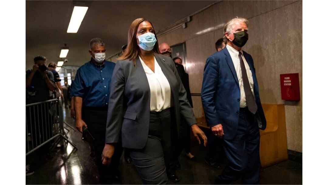 Letitia James, attorney general of New York, and Cyrus Vance Jr., New York County district attorney, leave Manhattan criminal court, July 1, 2021, in New York.
