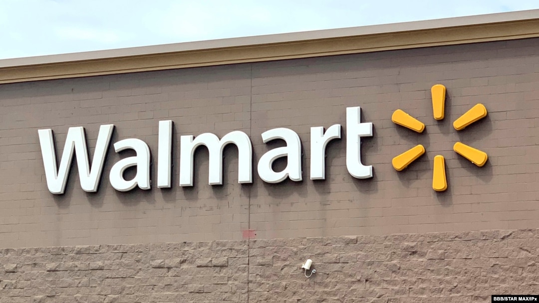 FILE - Shareholders will vote on whether Walmart should report on the fairness of its pay scale.