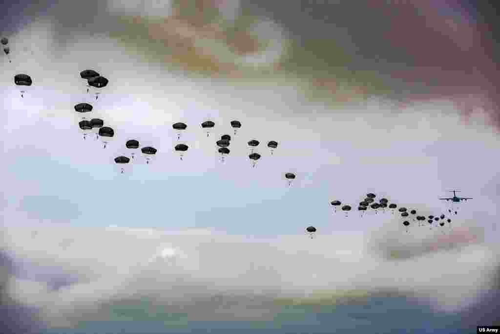 U.S. Army Paratroopers assigned to the 82nd Airborne Division participate in the 82nd Airborne Division Airborne Review during All American Week XXIX, at Fort Bragg, North Carolina.