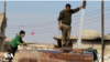 After the main water station in Kobani, Syria, was targeted, the city and its countryside were left without drinking water. Residents are getting water from wells and doctors are warning of an outbreak of diseases.