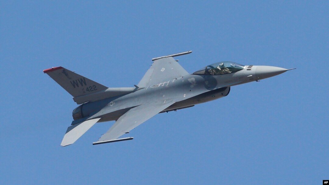 FILE- A U.S. F-16 performs during the Aero India 2017 in Bangalore, India, Feb. 16, 2017. The Trump administration told Congress Wednesday that it plans to approve a multibillion-dollar sale of F-16 fighter jets to Bahrain without the human rights conditions imposed by the Obama administration.
