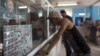 A picture of former Cuban President Fidel Castro is seen inside a post office in Havana, Dec. 11, 2015. 