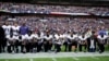 美国NFL球员集体抗议川普