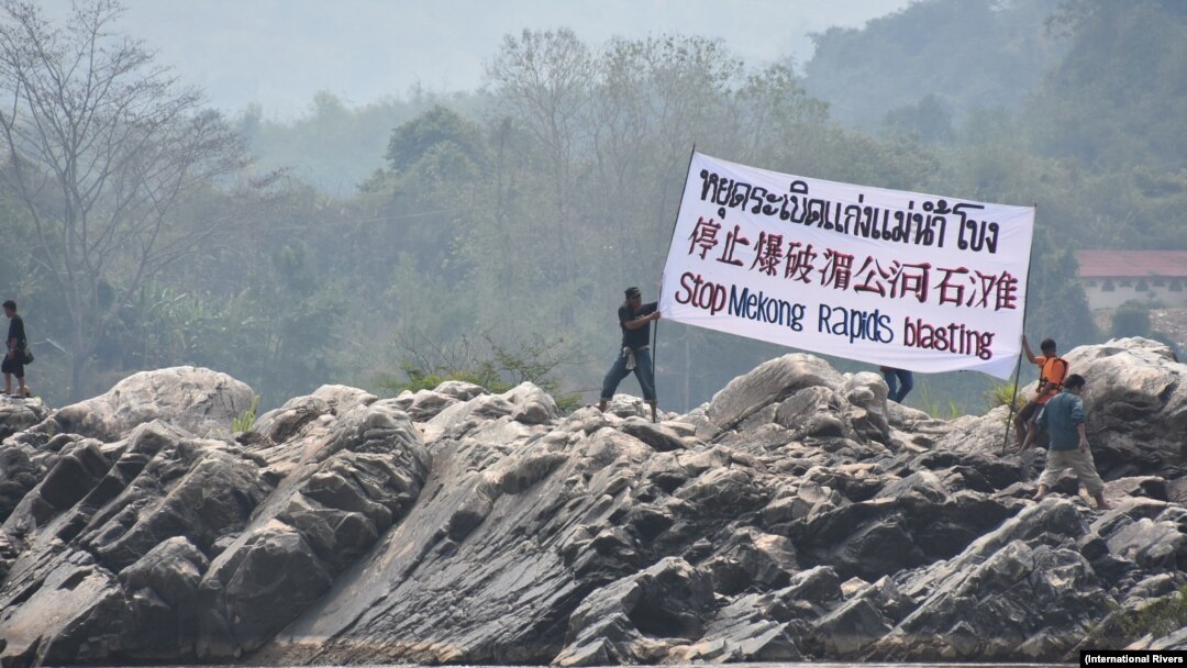 Activists protest against a Beijing-backed project to dredge and blow open a stretch of the Mekong River in northern Thailand in January 2017. (International Rivers)