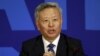 FILE - President of Asian Infrastructure Investment Bank (AIIB) Jin Liqun speaks at a news conference in Beijing.